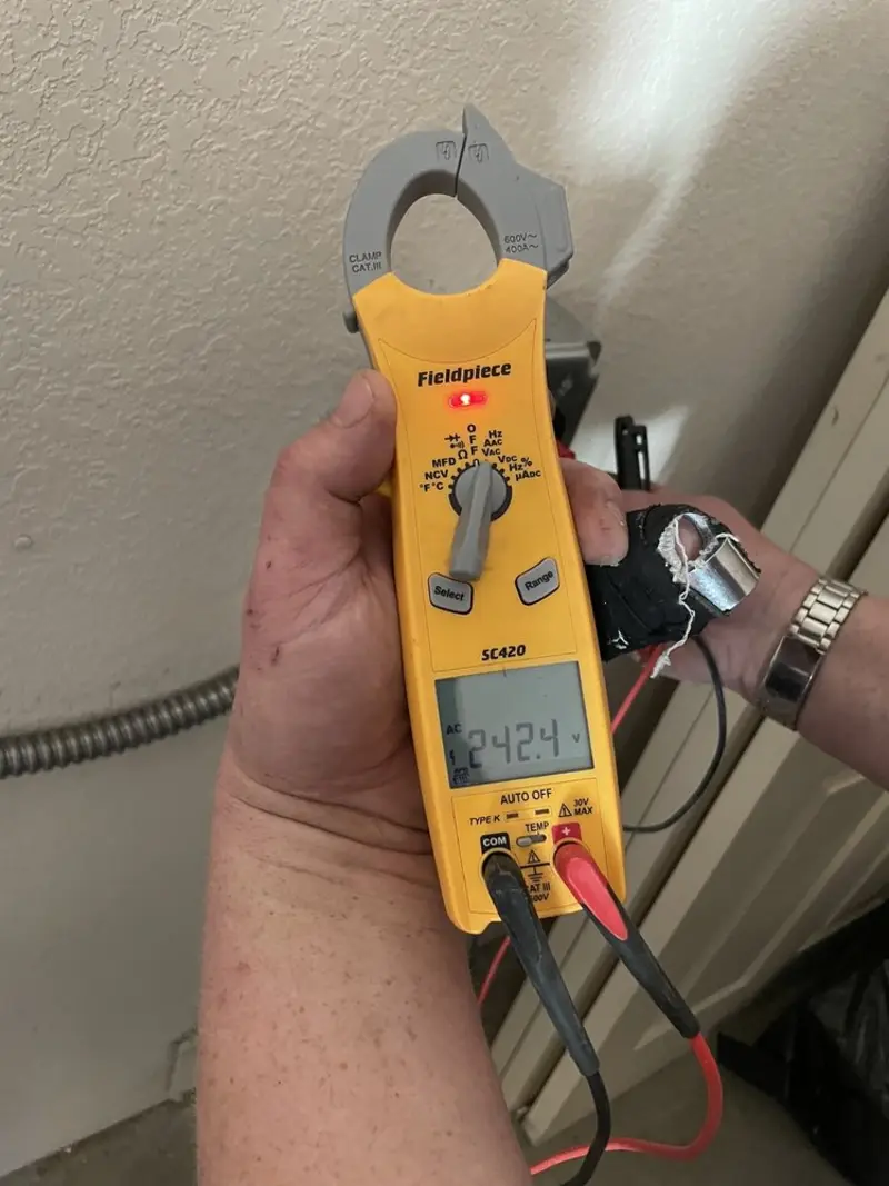 Voltage testing with clamp meter during Electrical Installation Services in Apple Valley